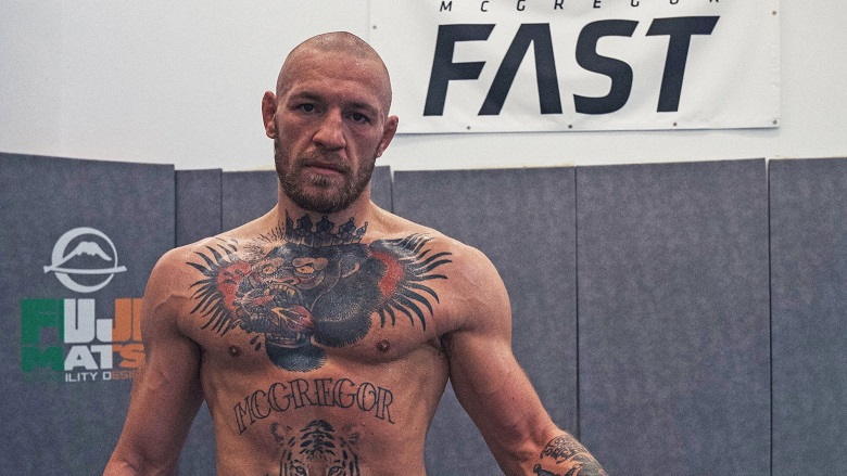 Conor McGregor thách thức Dustin Poirier đánh đôi công tại UFC 264 - Ảnh 1