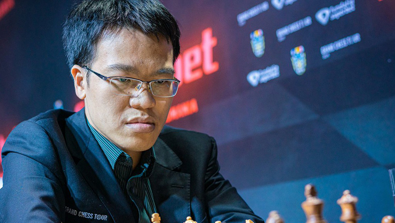 Quang Liêm hòa vua cờ Carlsen, dẫn đầu vòng bảng Charity Cup 2022 - Ảnh 1