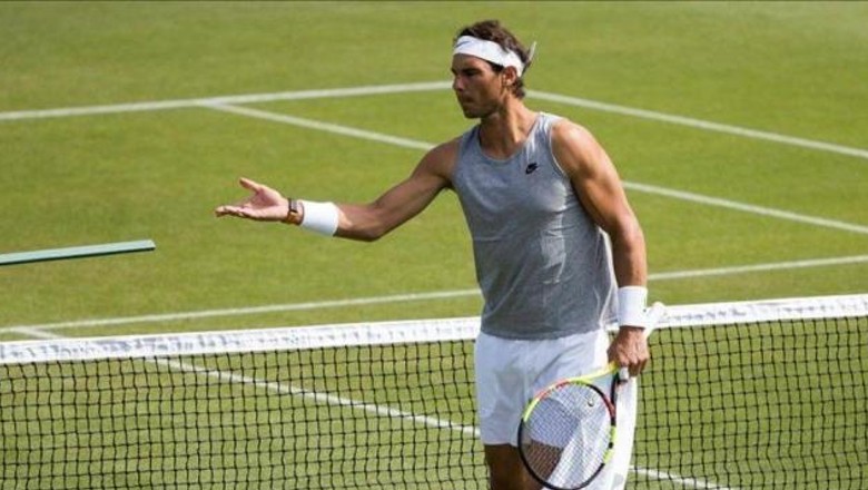 Nadal trở lại tập luyện trên sân cỏ 2 tuần trước Wimbledon - Ảnh 1